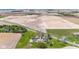 Wonderful aerial view of the property and surrounding landscape with mature trees and farm land at 4155 S State Rd 39, Lebanon, IN 46052