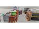 Attic storage space with carpeted floors and organizational storage at 4155 S State Rd 39, Lebanon, IN 46052