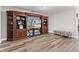 Finished basement featuring a wall entertainment center and modern wood-look floors at 4155 S State Rd 39, Lebanon, IN 46052