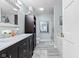 Modern bathroom featuring marble countertops, white cabinets, and a glass enclosed shower at 4155 S State Rd 39, Lebanon, IN 46052