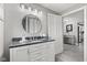 A clean and modern bathroom with a large vanity and a view leading to another room at 4155 S State Rd 39, Lebanon, IN 46052