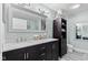 Modern bathroom featuring double sinks with marble countertops and stylish fixtures at 4155 S State Rd 39, Lebanon, IN 46052