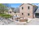 Inviting brick home featuring a patio with stylish outdoor furniture and meticulous landscaping at 4155 S State Rd 39, Lebanon, IN 46052