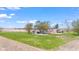 Exterior showcasing a well-maintained home and storage shed in a lush green setting at 4155 S State Rd 39, Lebanon, IN 46052