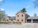 Beautiful brick home featuring a cozy outdoor seating area and an attached two-car garage at 4155 S State Rd 39, Lebanon, IN 46052