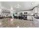 Bright kitchen boasting stone countertops, stainless appliances, and a center island at 4155 S State Rd 39, Lebanon, IN 46052