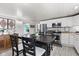Open kitchen with an island, stainless steel appliances, and tile flooring at 4155 S State Rd 39, Lebanon, IN 46052