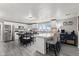 Open kitchen with stainless steel appliances, center island, and wood-look flooring at 4155 S State Rd 39, Lebanon, IN 46052
