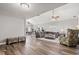 Spacious open-concept living room featuring wood-look floors and comfortable seating at 4155 S State Rd 39, Lebanon, IN 46052
