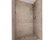 Tiled shower with mosaic tile floor, rainfall shower head and built in shelf at 4155 S State Rd 39, Lebanon, IN 46052