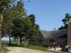 Charming brick home with a gray roof, flower boxes and landscaped yard at 4155 S State Rd 39, Lebanon, IN 46052
