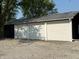 Three-car garage features a metal roof and white siding at 4155 S State Rd 39, Lebanon, IN 46052