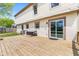 Side view of back deck with sliding glass doors to house, plus outdoor storage at 4322 Matrea More Ct, Indianapolis, IN 46254