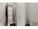Neutral bathroom showcasing a toilet and adjacent view of a bedroom and hallway at 4322 Matrea More Ct, Indianapolis, IN 46254