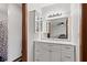Bathroom with a modern vanity and view to the bedroom through the doorway at 4322 Matrea More Ct, Indianapolis, IN 46254