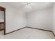 A bright bedroom featuring a ceiling fan, neutral carpet and trim at 4322 Matrea More Ct, Indianapolis, IN 46254