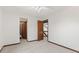 Spacious bedroom featuring neutral carpet, ceiling fan, and multiple entryways for convenience at 4322 Matrea More Ct, Indianapolis, IN 46254