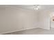 Bedroom with carpeted floors and adjacent to a bathroom with dual sinks at 4322 Matrea More Ct, Indianapolis, IN 46254