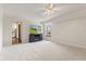 Bedroom features carpeted floors and a television with fireplace stand at 4322 Matrea More Ct, Indianapolis, IN 46254