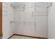 Walk-in closet space with ample shelving for optimal storage solutions and organization at 4322 Matrea More Ct, Indianapolis, IN 46254