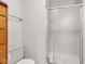 This bathroom features a stand-up shower with silver trim and sliding glass doors at 4322 Matrea More Ct, Indianapolis, IN 46254