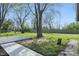 Spacious backyard with a partially shaded deck area at 4450 Bridgefield West Dr, Plainfield, IN 46168