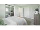 Well-lit bedroom with mirrored closet doors and neutral décor at 4450 Bridgefield West Dr, Plainfield, IN 46168