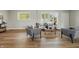 Cozy living room with natural light, modern decor, and an open floor plan at 4450 Bridgefield West Dr, Plainfield, IN 46168