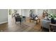 Bright living room featuring modern furnishings, a jute rug, and neutral paint colors at 4450 Bridgefield West Dr, Plainfield, IN 46168