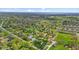 A picturesque aerial view of a vibrant neighborhood with lush greenery and well-maintained homes at 4525 Shelbyville Rd, Indianapolis, IN 46237