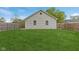 Backyard featuring green grass and a wooden fence at 4525 Shelbyville Rd, Indianapolis, IN 46237