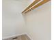 This closet has neutral walls, carpet, and a shelf at 4525 Shelbyville Rd, Indianapolis, IN 46237