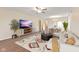 Inviting living room featuring stylish decor, a patterned rug, and comfortable seating, perfect for relaxation at 4525 Shelbyville Rd, Indianapolis, IN 46237