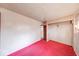Bedroom with red carpet and a closet with sliding doors, ample natural light from a window at 476 Southgate Dr, Greenwood, IN 46143