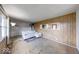Bright living room with unique wood paneling, open layout, and ample natural light at 476 Southgate Dr, Greenwood, IN 46143
