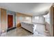 Living room with wood paneling and large window at 476 Southgate Dr, Greenwood, IN 46143