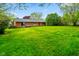 Expansive backyard with lush green lawn offering plenty of space for outdoor activities and relaxation at 507 S Grant St, Brownsburg, IN 46112