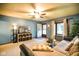 Inviting living room featuring a ceiling fan, and cozy furniture at 507 S Grant St, Brownsburg, IN 46112