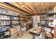 Unfinished basement with exposed ceiling and shelving, ready for customization at 5158 Montview Way, Noblesville, IN 46062