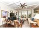 Inviting living room featuring coffered ceilings, dark wood floors, and an abundance of natural light at 5158 Montview Way, Noblesville, IN 46062