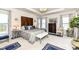 Spacious main bedroom features a tray ceiling, elegant furnishings, and an abundance of natural light at 5158 Montview Way, Noblesville, IN 46062