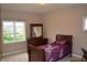 Bedroom with a bed, dresser with mirror, and two windows offering a view of the outdoors at 5361 Ashby Ct, Greenwood, IN 46143