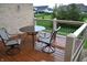 Relaxing backyard deck with patio furniture and a view of the landscaped yard at 5361 Ashby Ct, Greenwood, IN 46143