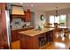 Spacious kitchen with granite countertops and stainless steel appliances and large island at 5361 Ashby Ct, Greenwood, IN 46143