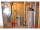 Utility room with water heater, softener, HVAC duct, and yellow insulation at 5361 Ashby Ct, Greenwood, IN 46143