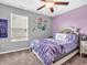 This bedroom features a large window and a plush comforter at 546 Freedom Dr, Pittsboro, IN 46167