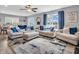 Cozy living room with plush seating, natural light, and modern decor at 546 Freedom Dr, Pittsboro, IN 46167