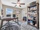 This home office has a large desk and a full bookcase at 546 Freedom Dr, Pittsboro, IN 46167