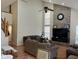 Spacious living room with high ceilings, brick fireplace, and large windows for natural light at 5640 Dapple Ct, Indianapolis, IN 46228