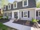 Close up of the front of a charming two-story home, landscaped and inviting at 5829 Lasalle St, Indianapolis, IN 46220